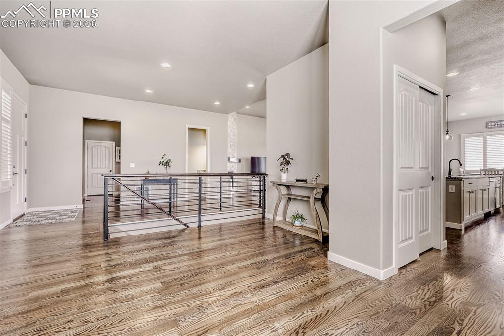 Image 11 of 44: Virtually staged formal dining of foyer. Also potential sitting, library or