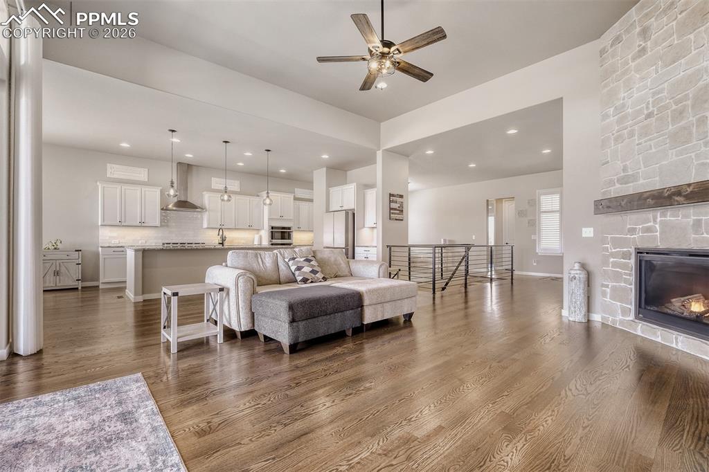 Image 12 of 44: Virtually staged formal dining of foyer. Also potential sitting, library or