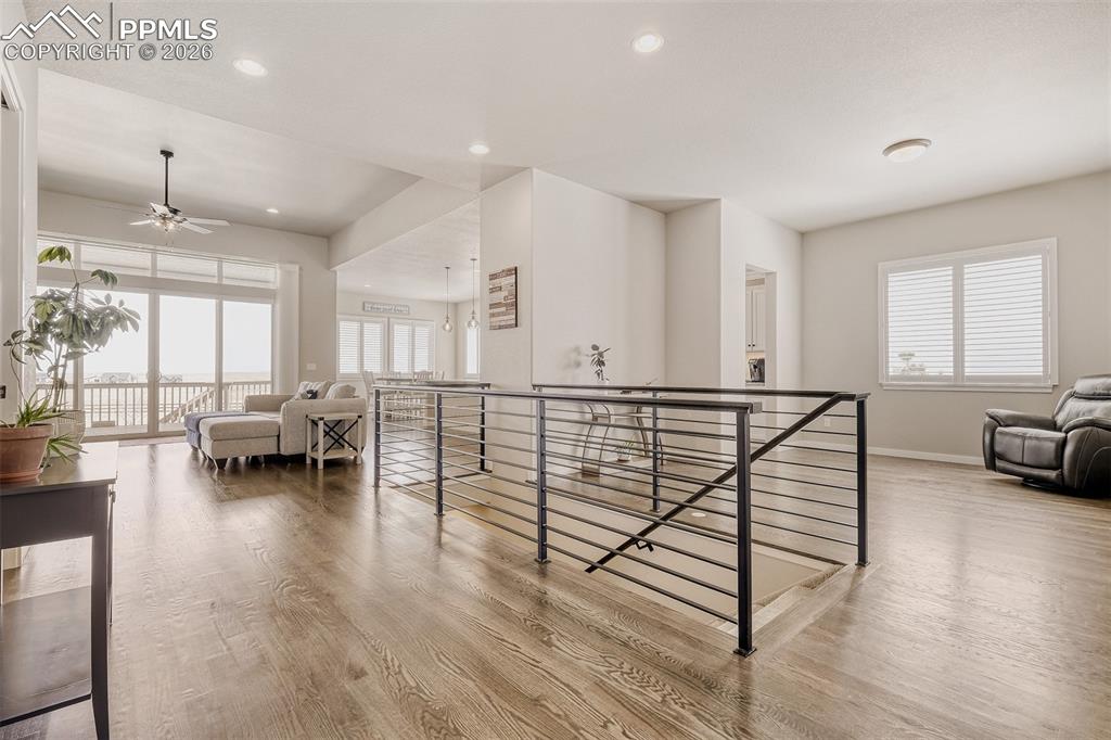 Image 7 of 44: Virtually staged formal dining of foyer. Also potential sitting, library or