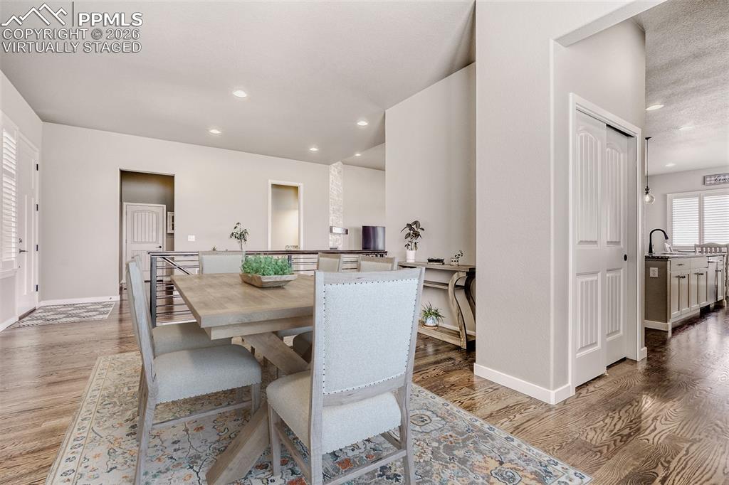 Image 9 of 44: Formal dining of foyer. Also potential sitting, library or music room. 