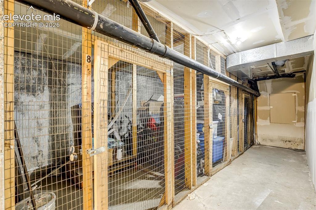 Image 43 of 50: Locked Basement storage with secure area for each unit, as well as a larger