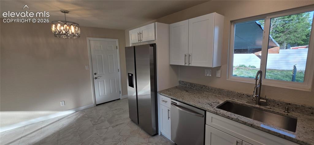 Image 10 of 28: Kitchen