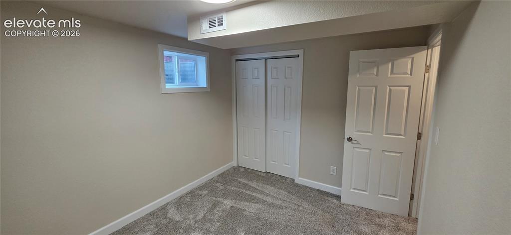 Image 20 of 28: Bedroom