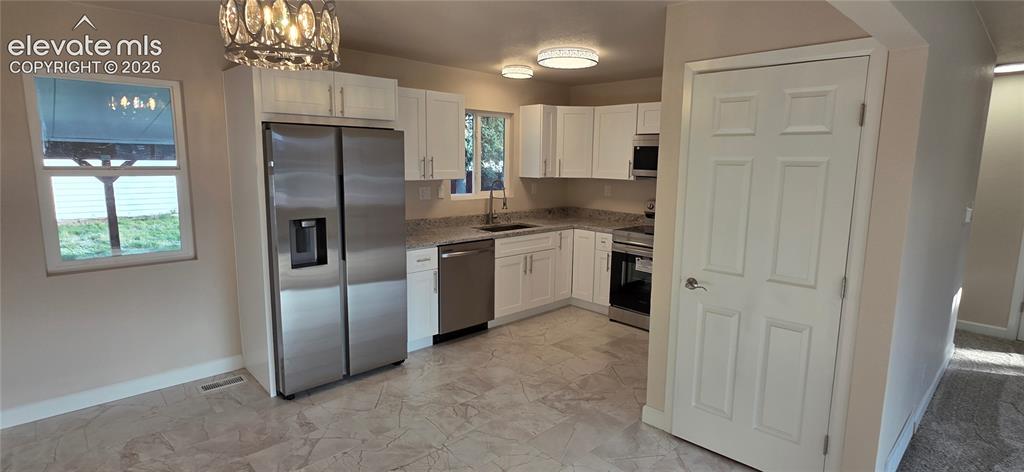 Image 6 of 28: Kitchen