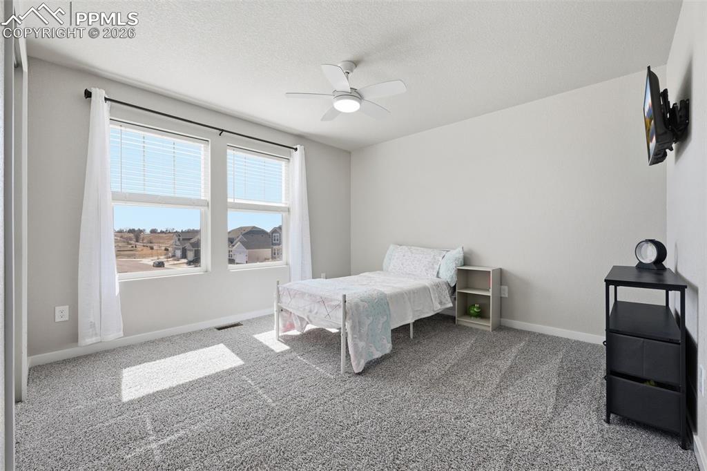 Image 18 of 38: Bedroom