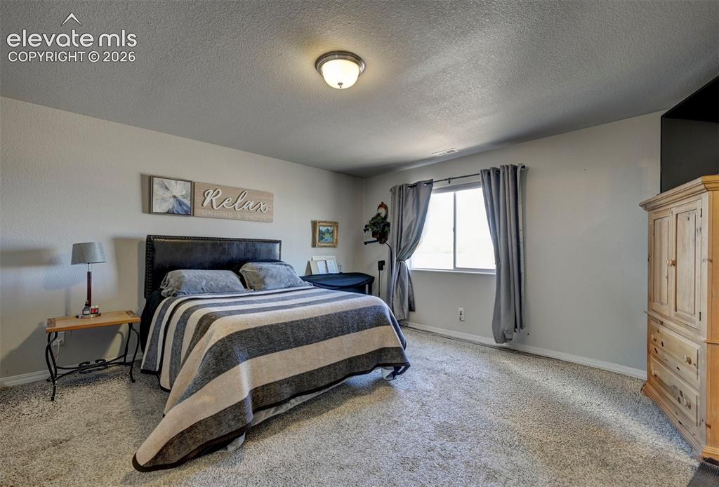 Image 19 of 37: Bedroom