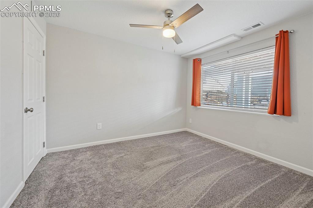 Image 36 of 49: Downstairs bedroom 5, garden window