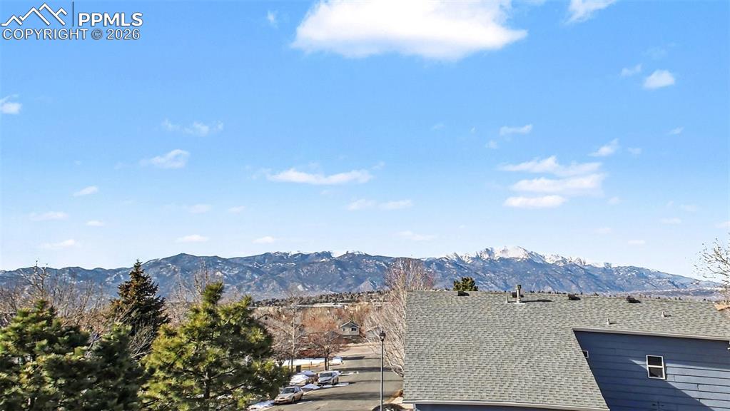 Image 15 of 28: Mountain view from primary bedroom