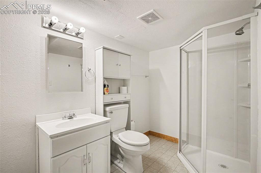 Image 23 of 28: Downstairs 3/4 bath