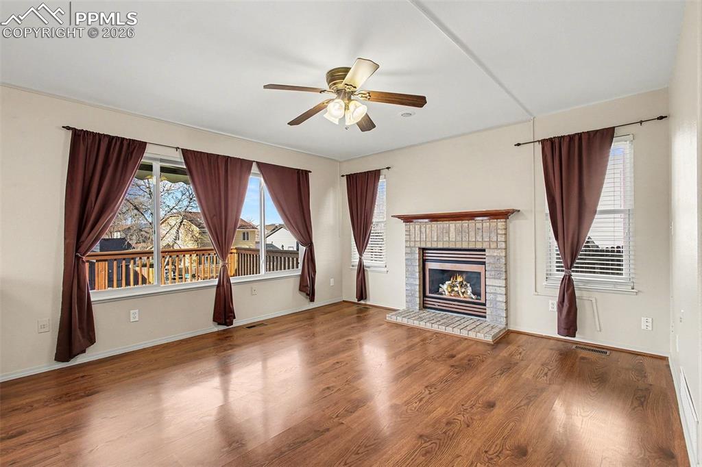 Image 9 of 28: Living room with fireplace