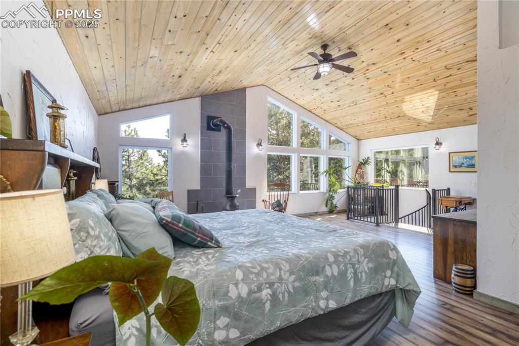 Image 22 of 47: Upper Level - Beetle Kill Pine Plank Ceiling