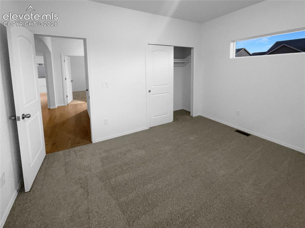 Image 10 of 13: Bedroom