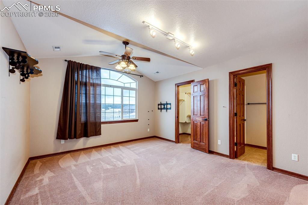 Image 28 of 49: Upstairs Ensuite Bed and Bath