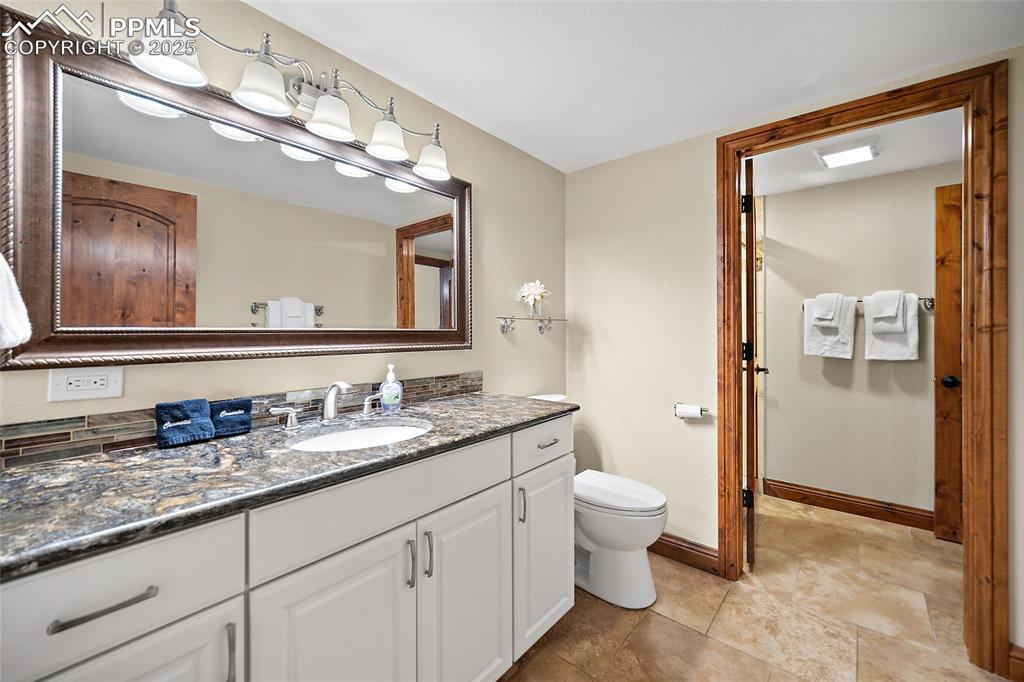 Image 24 of 47: Bathroom featuring vanity and toilet