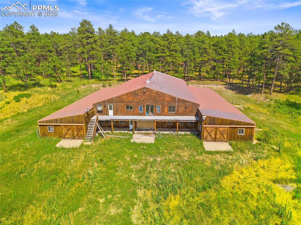 Image 3 of 47: View of barn and stables from above of property