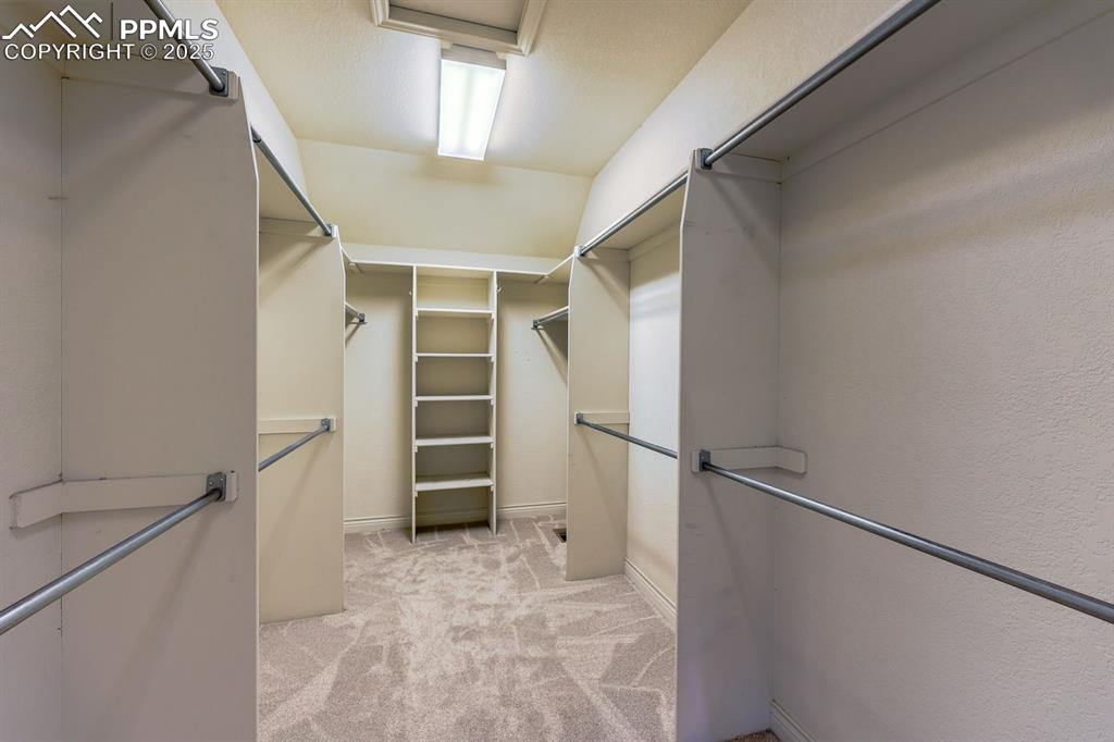 Image 25 of 44: Primary Bedroom Walk in Closet