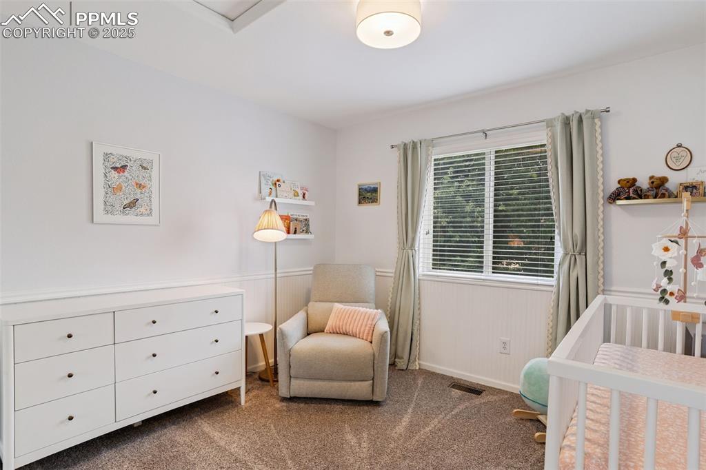 Image 25 of 40: Upstairs bedroom
