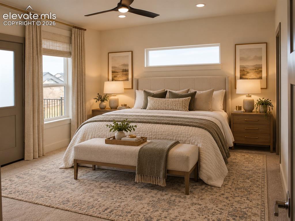 Image 25 of 44: Recessed ceiling lighting, ceiling fan, transom window, and a door with an 