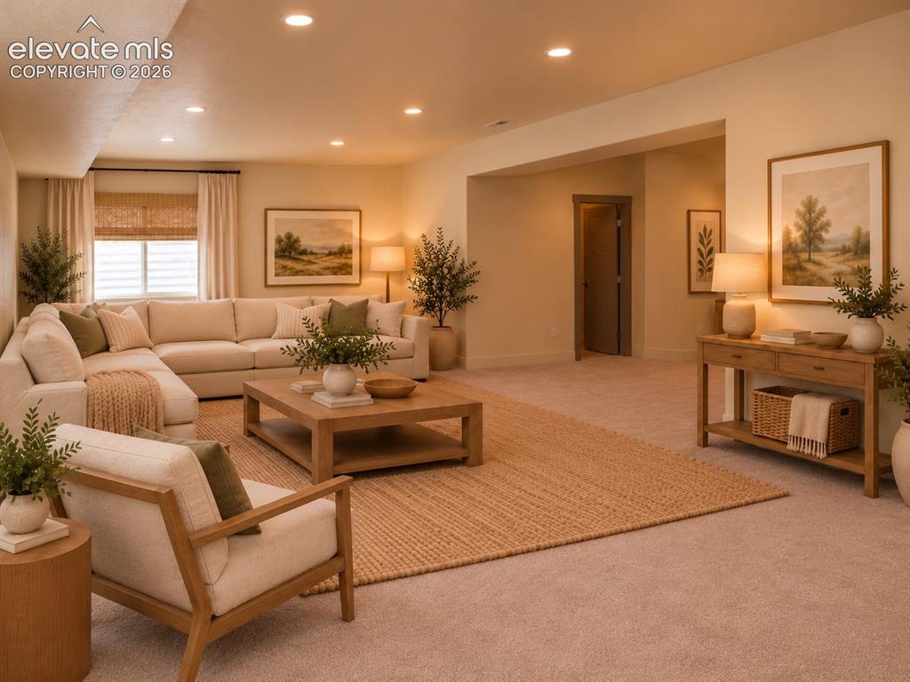 Image 39 of 44: Recessed ceiling lighting, carpeted flooring, wood-finish console table, an