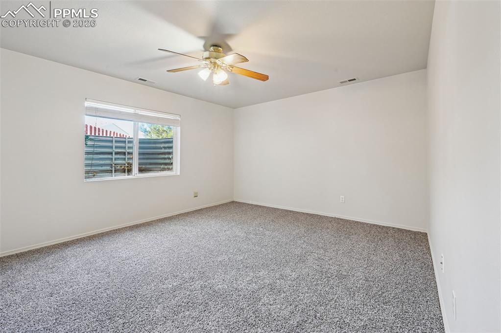 Image 28 of 35: 4th bedroom (basement) with two closets, garden level