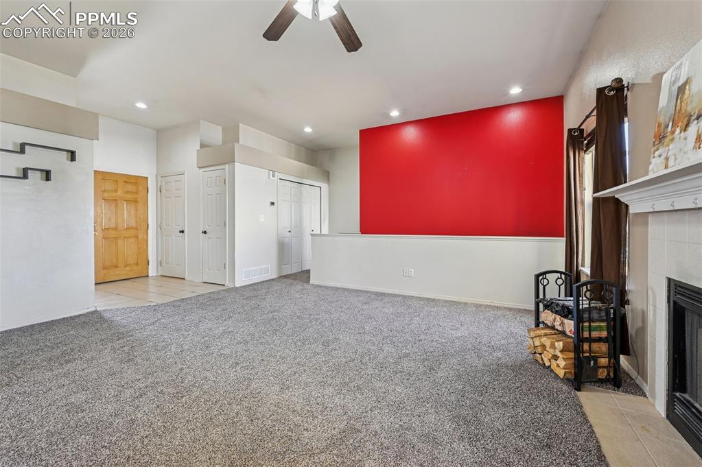 Image 4 of 35: Entry way with garage access and coat closet (Laundry space is conveniently
