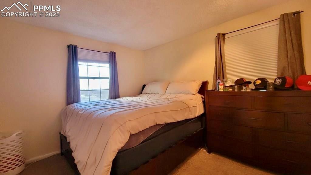 Image 6 of 13: Bedroom