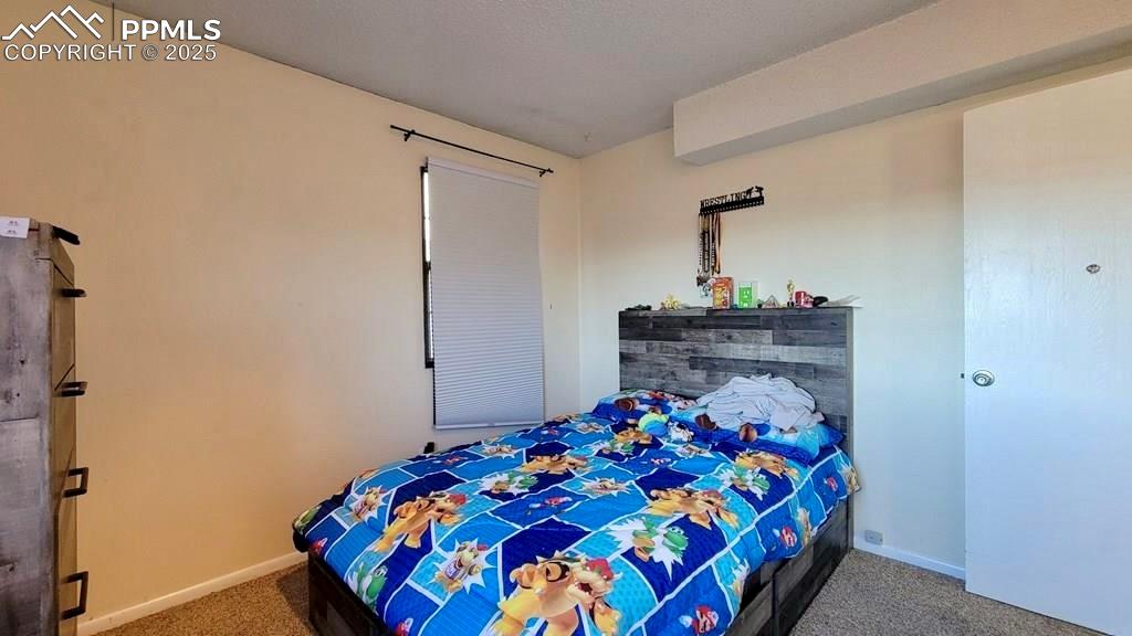 Image 8 of 13: Bedroom