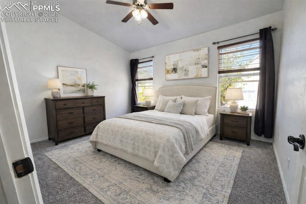 Image 17 of 37: Virtually staged primary bedroom