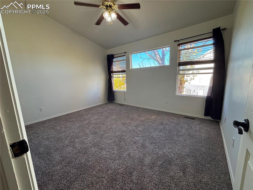 Image 18 of 37: Updated primary bedroom photo - new paint!