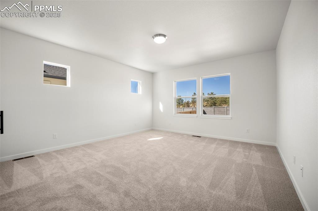 Image 12 of 50: Master Bedroom