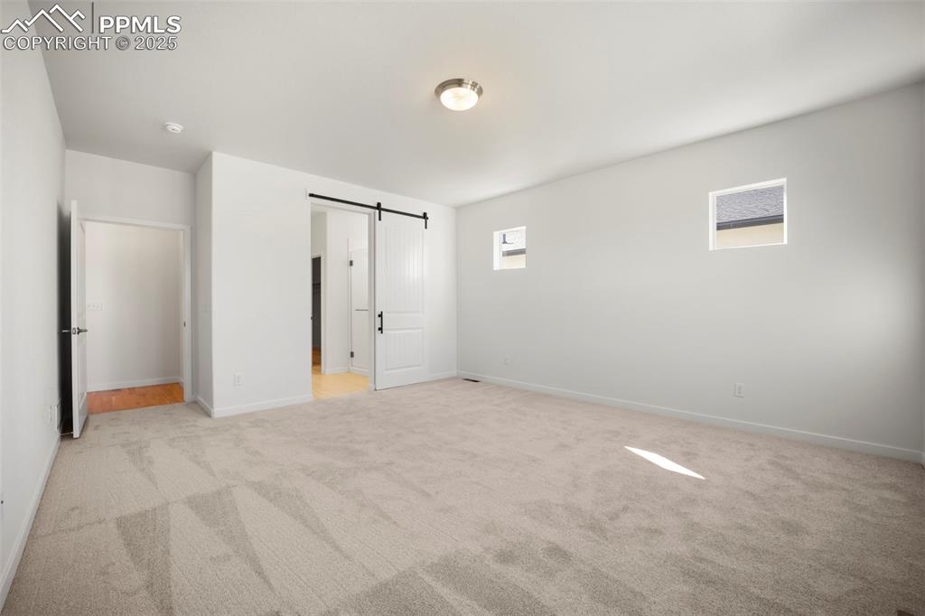 Image 13 of 50: Master Bedroom