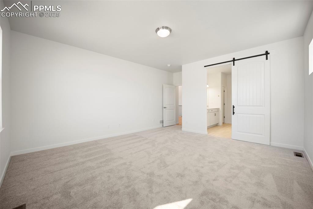 Image 14 of 50: Master Bedroom