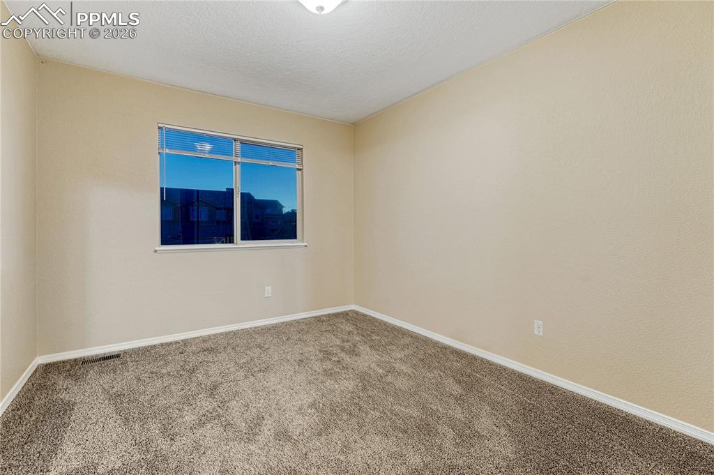 Image 34 of 50: 2nd bedroom