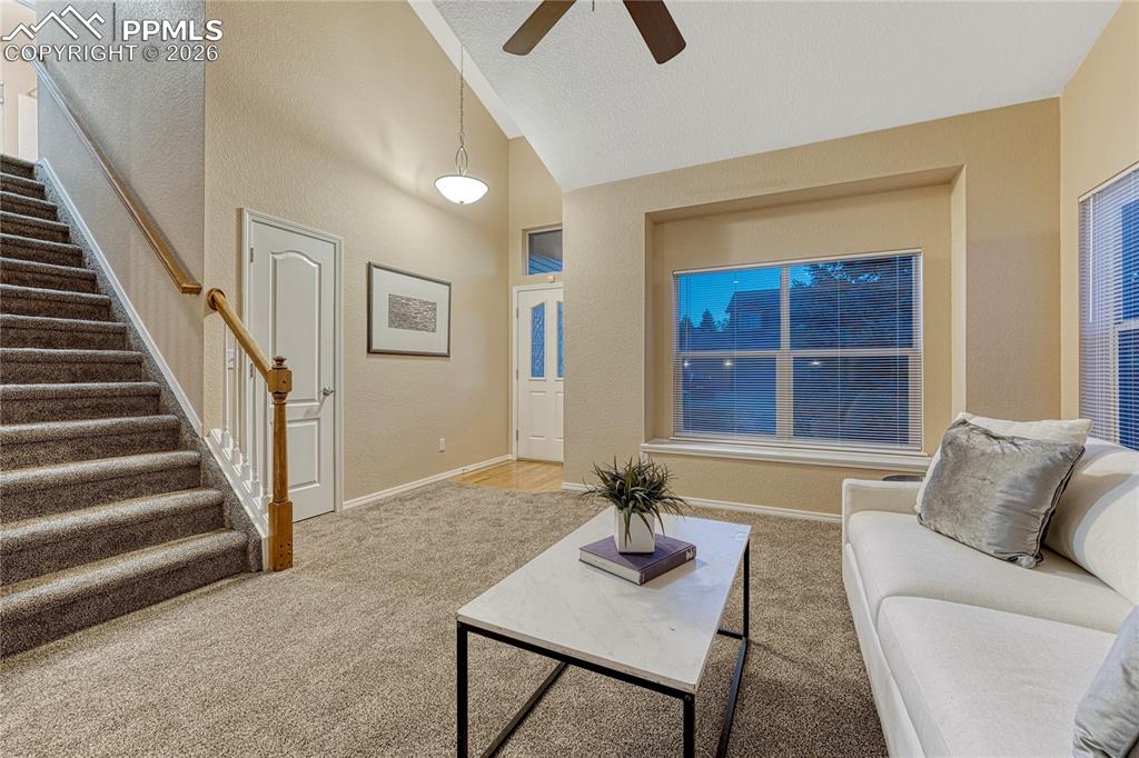 Image 6 of 50: Welcoming and spacious front room