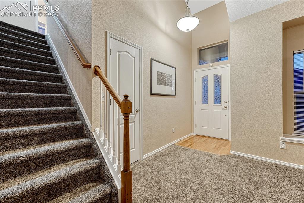 Image 7 of 50: Coat closet by the front door and plenty of space to come on inside