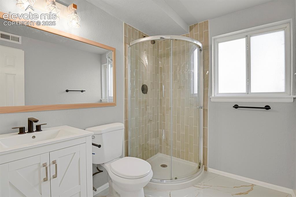 Image 22 of 29: Lower Level Bathroom