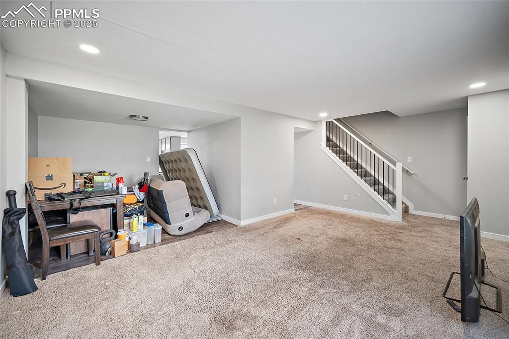Image 14 of 34: Playroom featuring carpet floors and recessed lighting