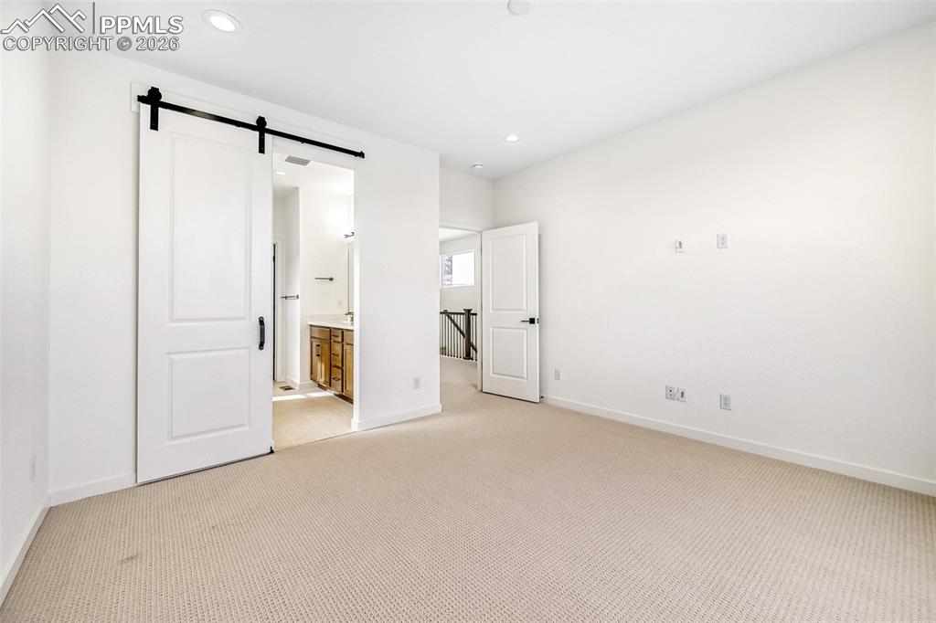 Image 9 of 14: Bedroom