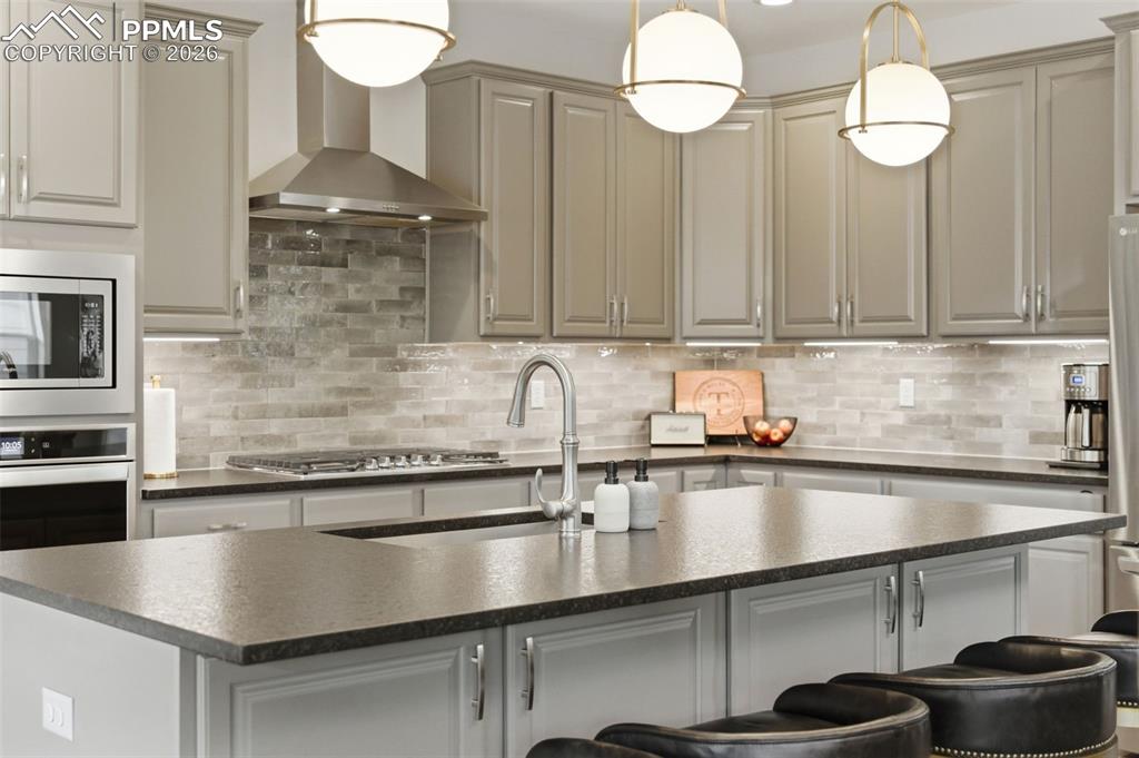 Image 11 of 50: Leathered black pearl granite countertops 