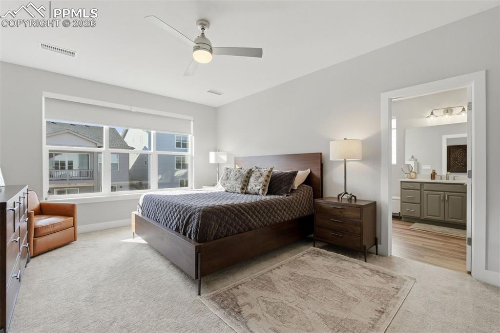 Image 24 of 50: Primary suite with attached bath 