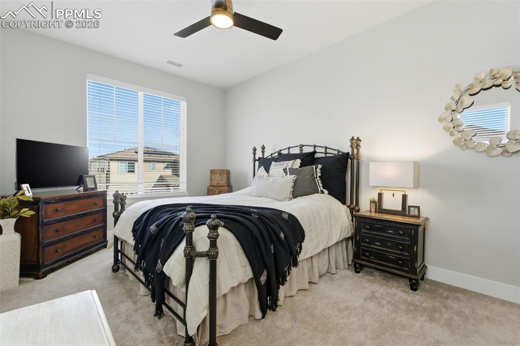 Image 31 of 50: Bedroom three with walk-in closet