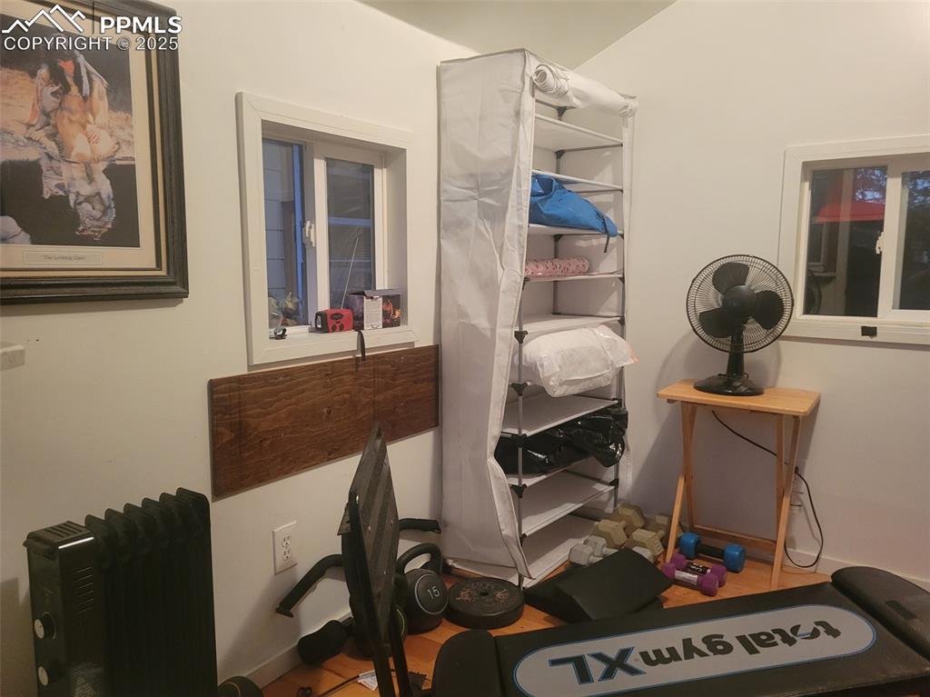 Image 25 of 27: Workout room with baseboards