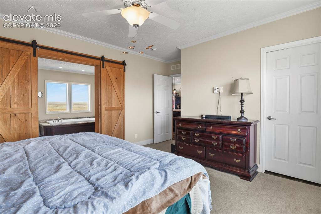 Image 12 of 50: Master Bedroom