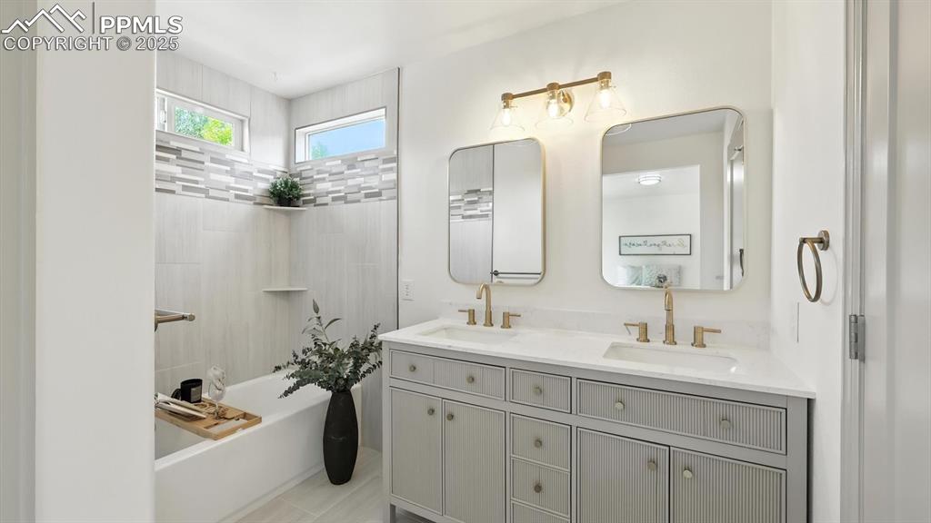 Image 36 of 50: Updated primary bathroom.