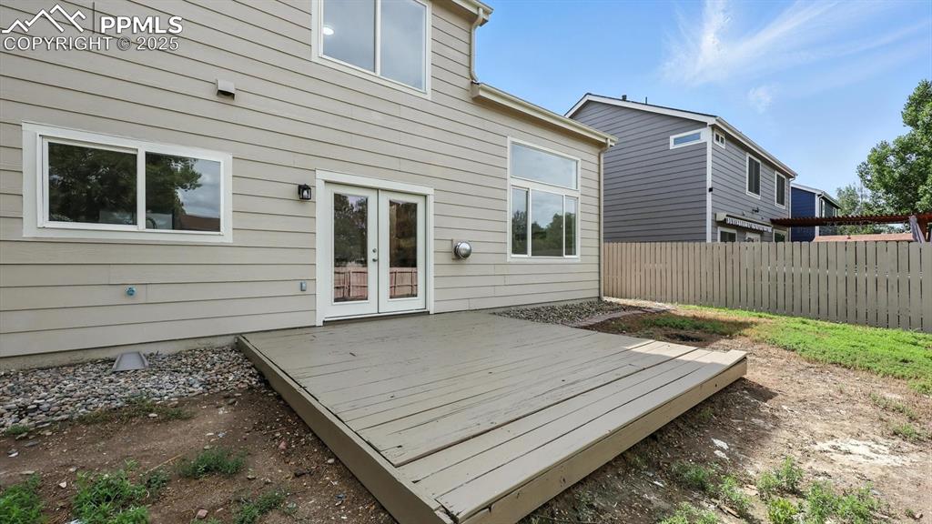Image 41 of 50: Backyard deck.