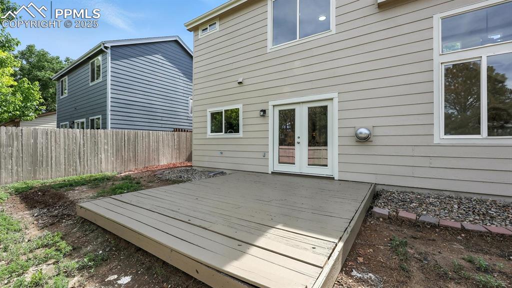 Image 44 of 50: The deck is located off the dining area making it easy to expand indoor/out