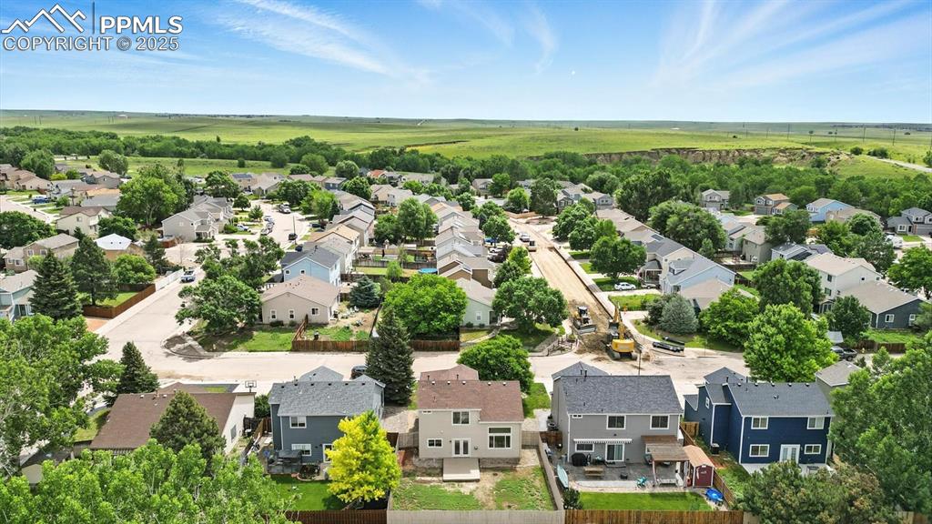 Image 49 of 50: Aerial rear view of home and neighborhood.