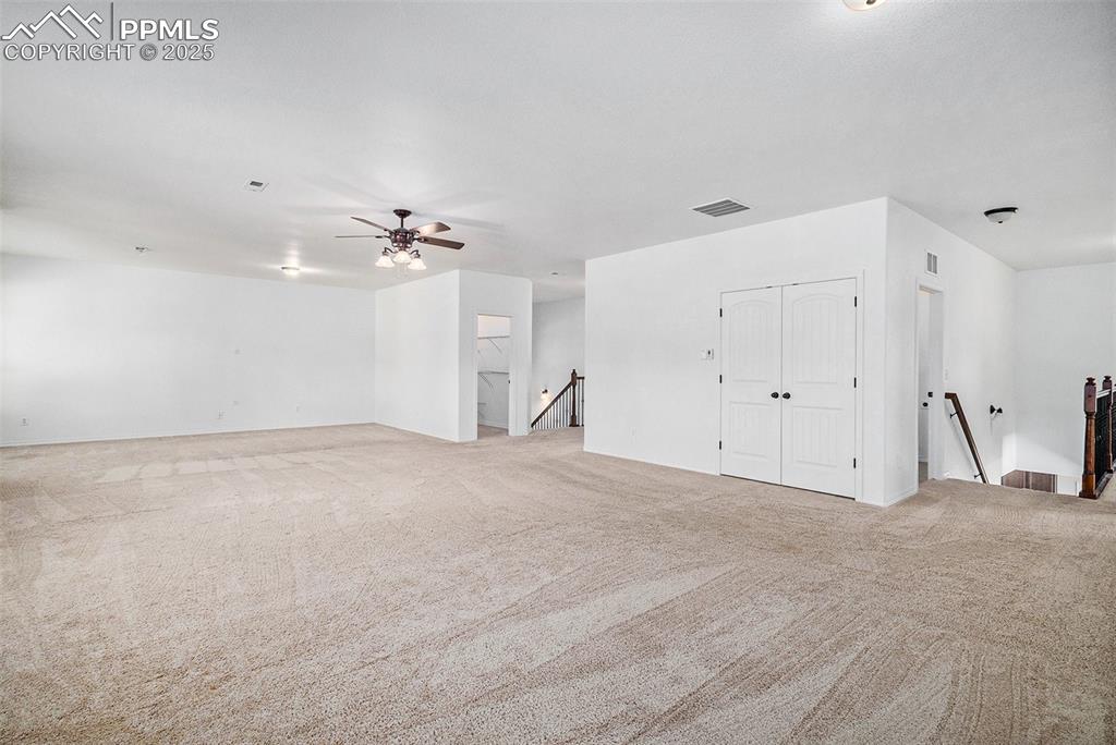 Image 35 of 44: Expansive additional living area upstairs!