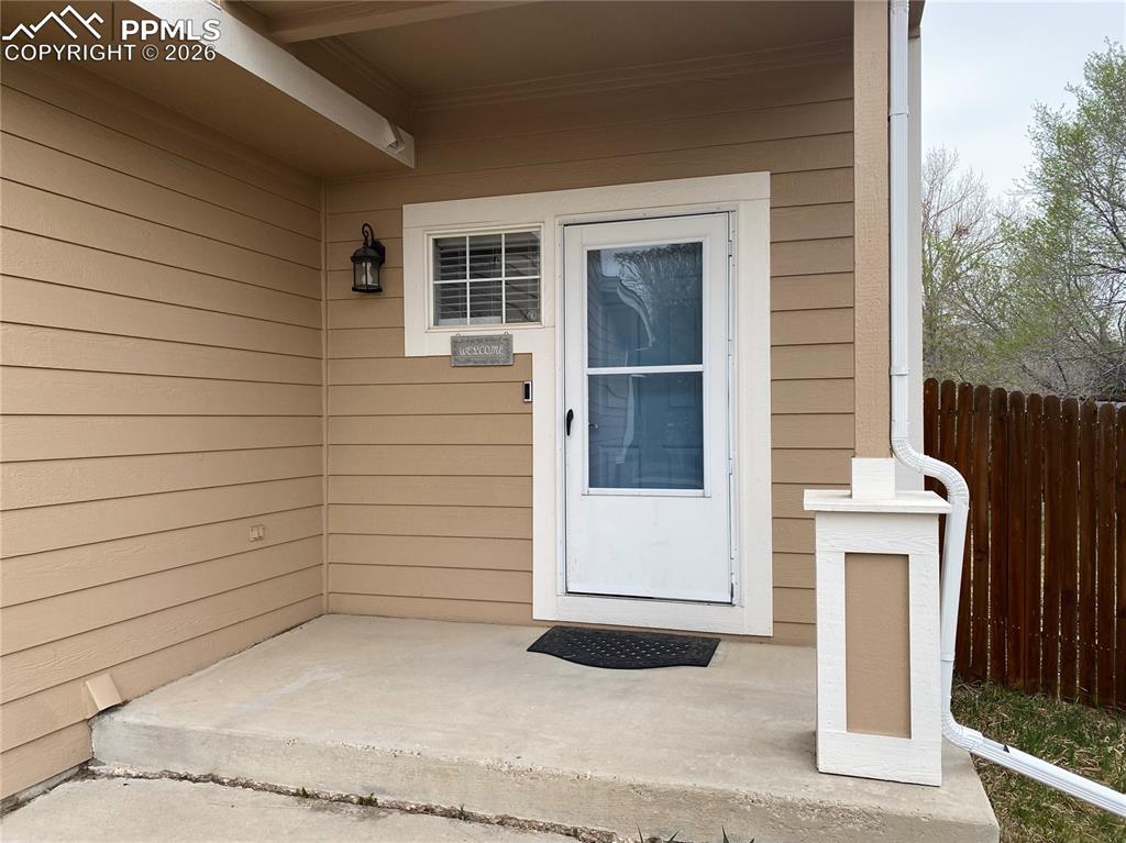 Image 11 of 34: The covered front entry welcomes you