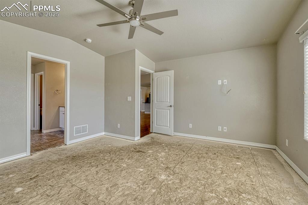 Image 12 of 45: Envision your dream bedroom in this spacious primary suite, complete with a